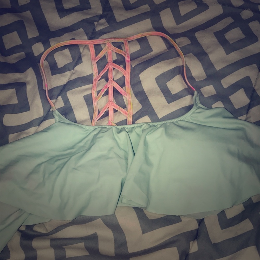 Pink swimsuit top only worn one year. Size medium